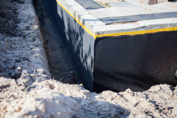 Professional Waterproofing technician working in East Fultonham, OH